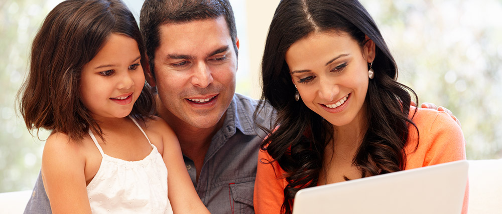 Parents and child looking at courses