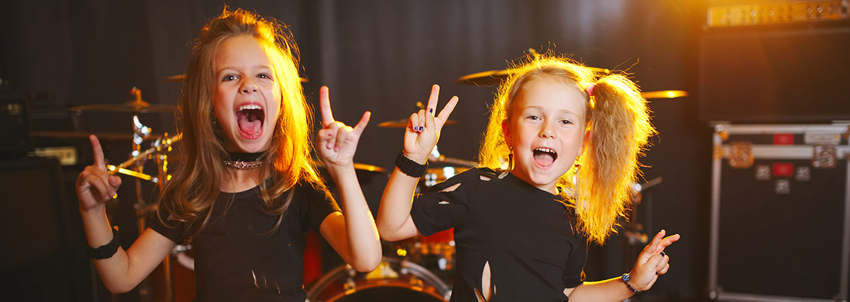 Two girls within a rock band